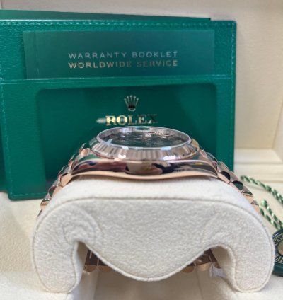 Rolex Day-date 40 Rose Gold Chocolate Roman Dial Fluted Bezel 228235