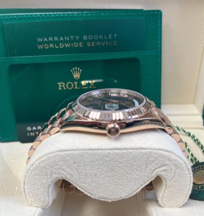 Rolex Day-date 40 Rose Gold Chocolate Roman Dial Fluted Bezel 228235