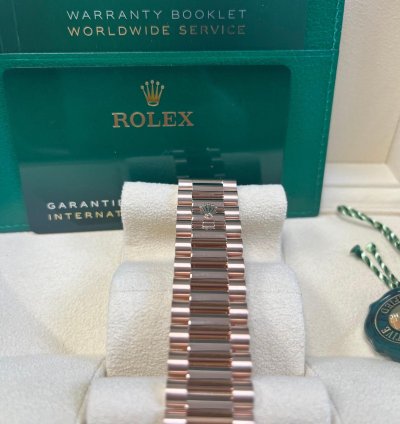 Rolex Day-date 40 Rose Gold Chocolate Roman Dial Fluted Bezel 228235
