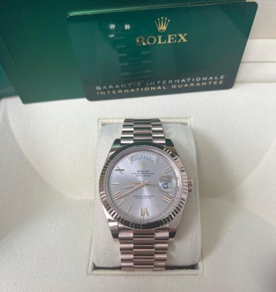 Rolex Day-date 40 Rose Gold Sundust Roman Dial Fluted Bezel 228235
