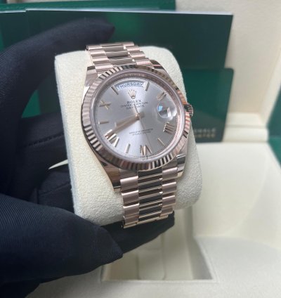 Rolex Day-date 40 Rose Gold Sundust Roman Dial Fluted Bezel 228235