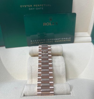 Rolex Day-date 40 Rose Gold Sundust Roman Dial Fluted Bezel 228235