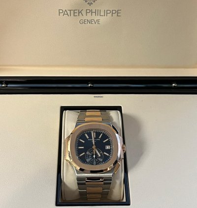 Patek Philippe Nautilus Rose Gold Stainless Steel Blue Dial Mens Watch 5980 1ar