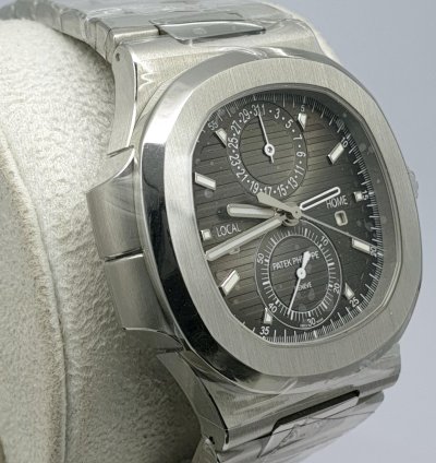 Patek Philippe Nautilus Travel Time Like New