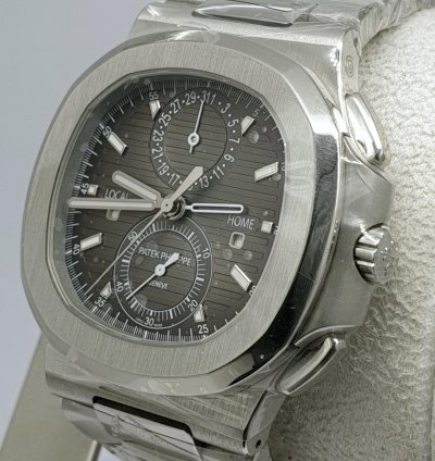 Patek Philippe Nautilus Travel Time Like New