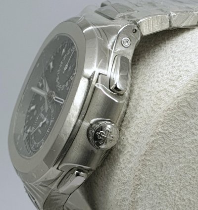 Patek Philippe Nautilus Travel Time Like New