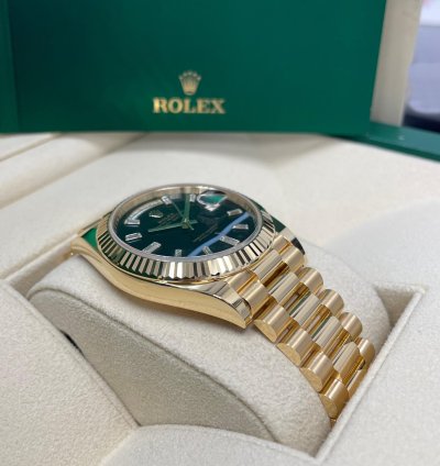 Rolex Day-date 40 Unworn Day-date 40mm 228238 Yellow Gold Presidential Band Onyx Black Baguette Dial