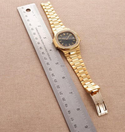 Patek Philippe Nautilus Yellow Gold Nautilus Ref 3700 With Diamond Bezel