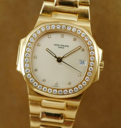 Patek Philippe Nautilus Yellow Gold Nautilus Ref 3800 With Diamond Bezel And Ceramic Dial