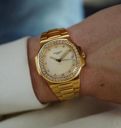 Patek Philippe Nautilus Yellow Gold Nautilus Ref 3800 With Diamond Bezel And Ceramic Dial