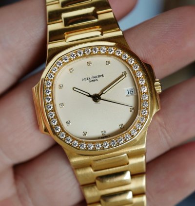 Patek Philippe Nautilus Yellow Gold Nautilus Ref 3800 With Diamond Bezel And Ceramic Dial
