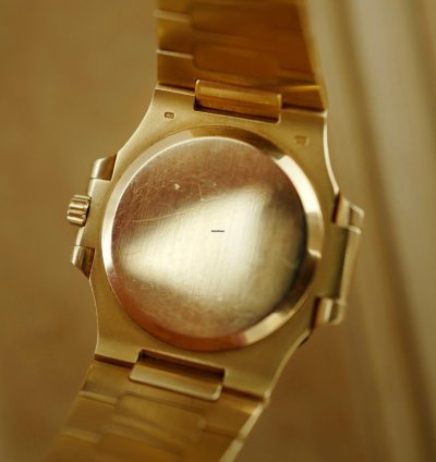 Patek Philippe Nautilus Yellow Gold Nautilus Ref 3800 With Diamond Bezel And Ceramic Dial