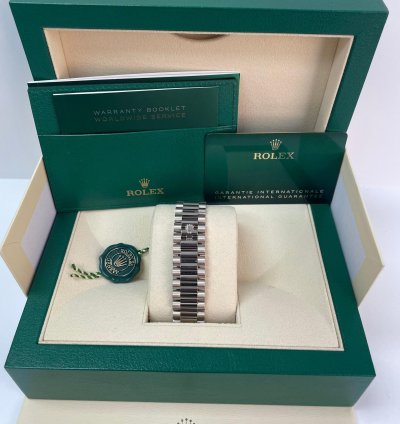 Rolex Day-date 40 White Gold Day-date 40 Fluted Bezel White Roman Dial President Bracelet 228239