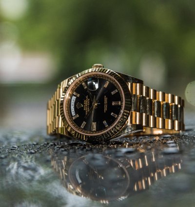 Rolex Day-date 40 Yellow Gold - Black Dial - Diamond Baguette