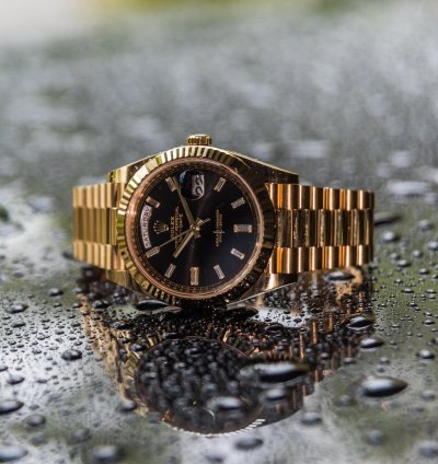 Rolex Day-date 40 Yellow Gold - Black Dial - Diamond Baguette