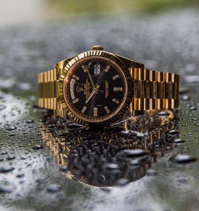 Rolex Day-date 40 Yellow Gold - Black Dial - Diamond Baguette