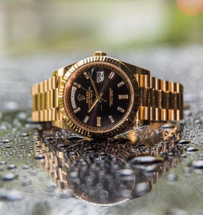Rolex Day-date 40 Yellow Gold - Black Dial - Diamond Baguette