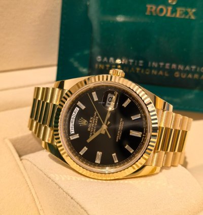 Rolex Day-date 40 Yellow Gold Black Baguette Dial