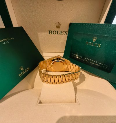 Rolex Day-date 40 Yellow Gold Black Baguette Dial