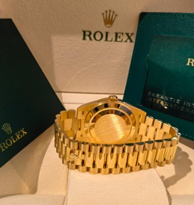Rolex Day-date 40 Yellow Gold Black Baguette Dial