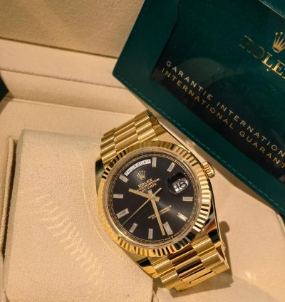 Rolex Day-date 40 Yellow Gold Black Baguette Dial