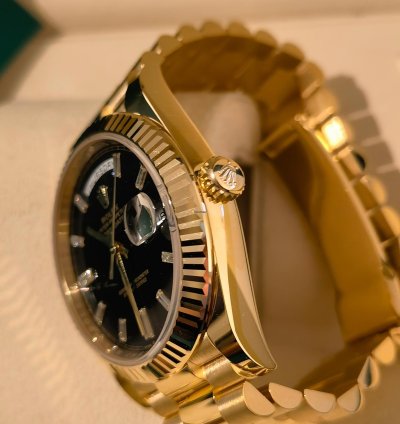 Rolex Day-date 40 Yellow Gold Black Baguette Dial