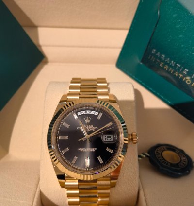 Rolex Day-date 40 Yellow Gold Black Baguette Dial