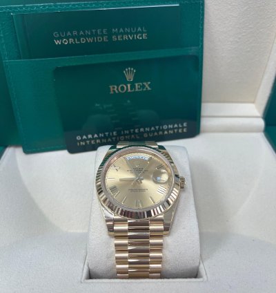 Rolex Day-date 40 Yellow Gold Champagne Roman Dial Fluted Bezel 228238