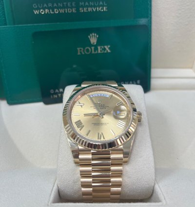 Rolex Day-date 40 Yellow Gold Champagne Roman Dial Fluted Bezel 228238