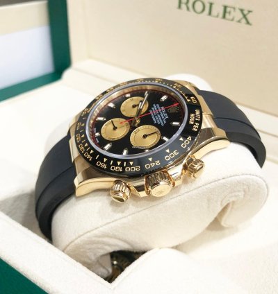 Rolex Daytona Unworn Daytona 116518 Yellow Gold 40mm Black Paul Newman Index Dial Black Oysterflex