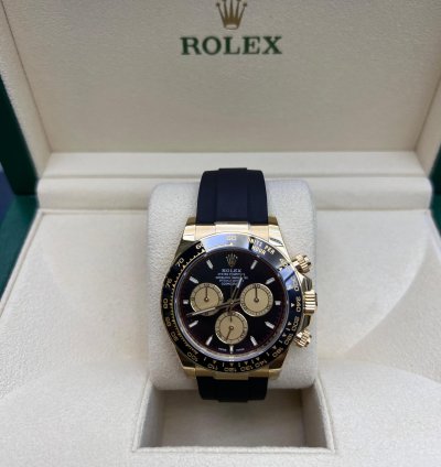 Rolex Daytona Yellow Gold Black And Champagne Dial Oysterflex Bracelet