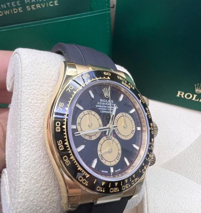 Rolex Daytona Yellow Gold Black And Champagne Dial Oysterflex Bracelet