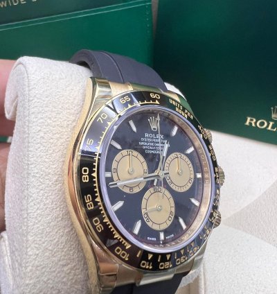 Rolex Daytona Yellow Gold Black And Champagne Dial Oysterflex Bracelet