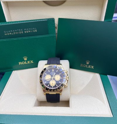 Rolex Daytona Yellow Gold Black And Champagne Dial Oysterflex Bracelet