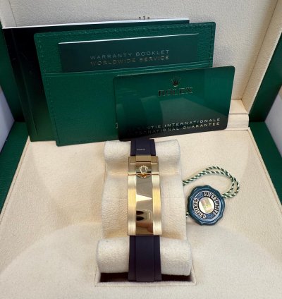 Rolex Daytona Yellow Gold Black Cerachrom Bezel White Index Dial Oysterflex Strap 126518ln