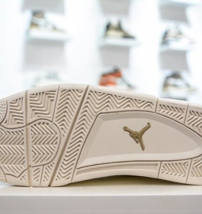 Air Jordan 4 Retro Metallic Gold