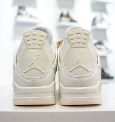 Air Jordan 4 Retro Metallic Gold