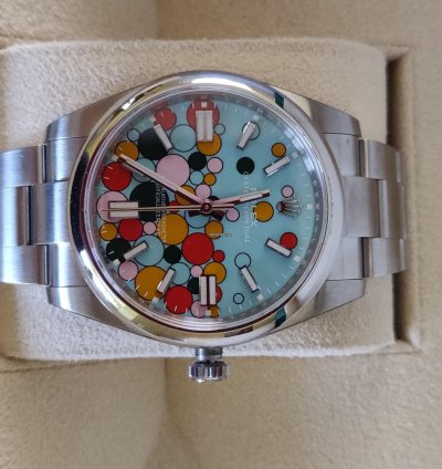 Rolex Oyster Perpetual 41 124300 41 Celebration Dial stickers