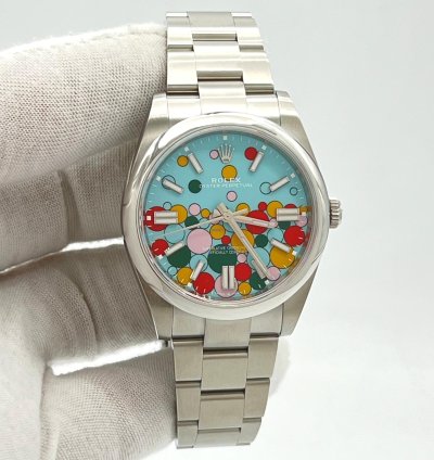 Rolex Oyster Perpetual 41 Turquoise Blue Celebration Motif Index Dial