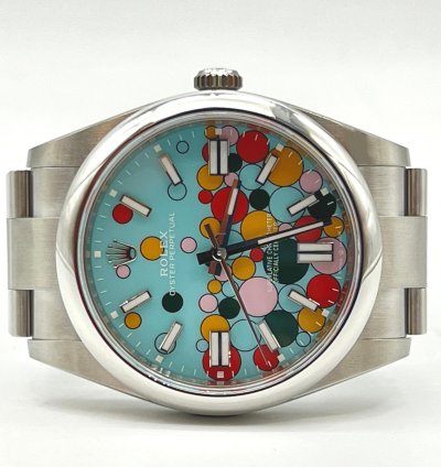 Rolex Oyster Perpetual 41 Turquoise Blue Celebration Motif Index Dial
