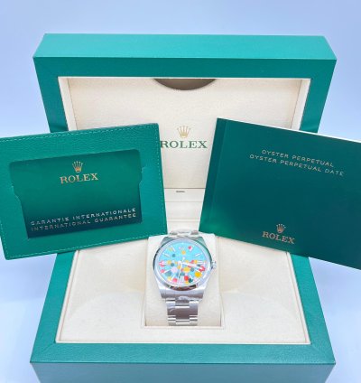 Rolex Oyster Perpetual 41 Turquoise Blue Celebration Motif Index Dial