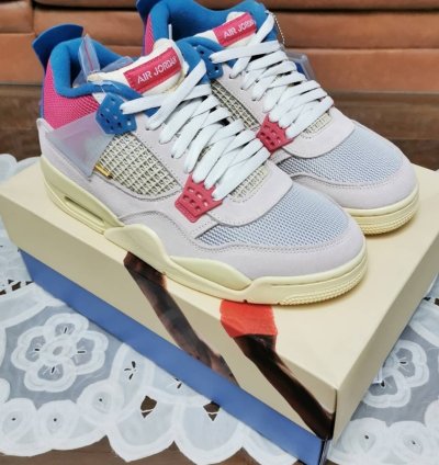 Jordan 4 Retro Union Guava Ice