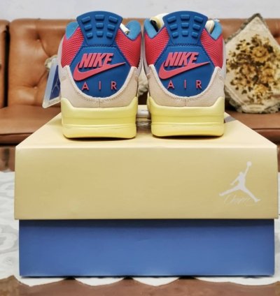 Jordan 4 Retro Union Guava Ice