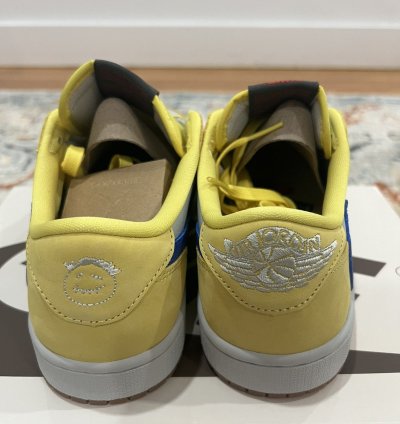 Travis Scott Jordan 1 Low Canary