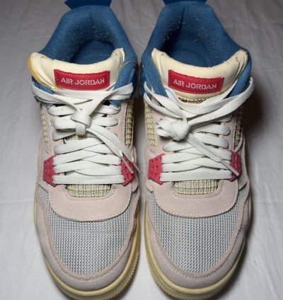 Jordan 4 Retro Union Guava Ice