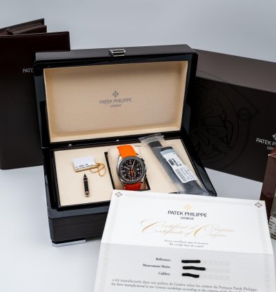 Patek Philippe Aquanaut 5968a Steel Black Dial - Full Set Orange Black Uncut Strap