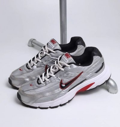 Nik E Initiator Low Metallic Silver Sneakers
