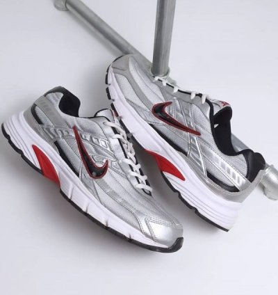 Nik E Initiator Low Metallic Silver Sneakers