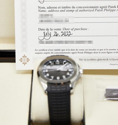 Patek Philippe Aquanaut Stainless Steel Black Dial Complete Set Mint 2022