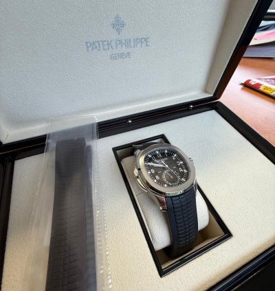 Patek Philippe Aquanaut Travel Time Box Papiere